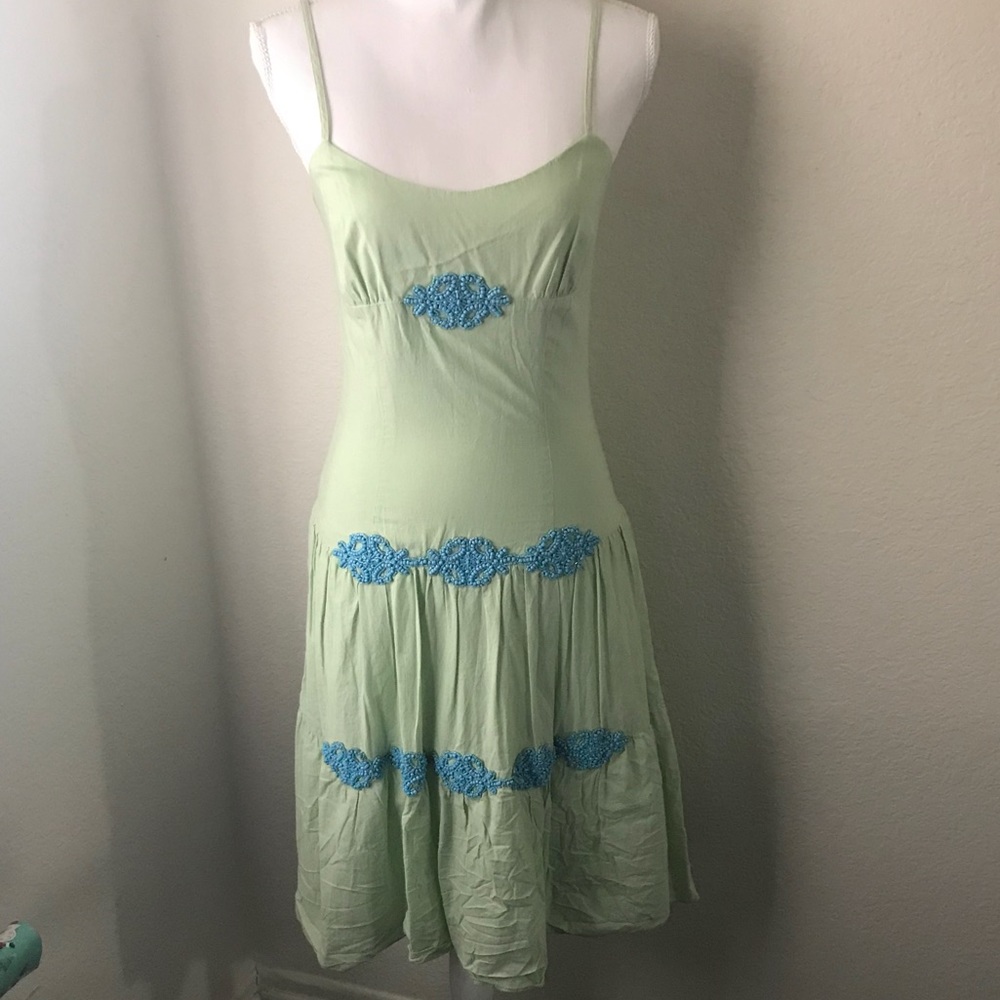 Beaded dress with tiered skirt